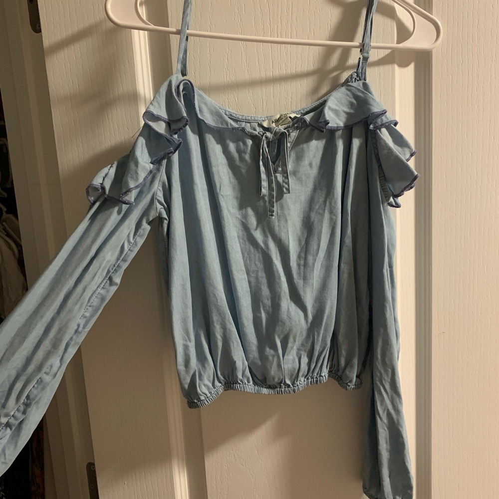 Over-the-shoulder Blue Top